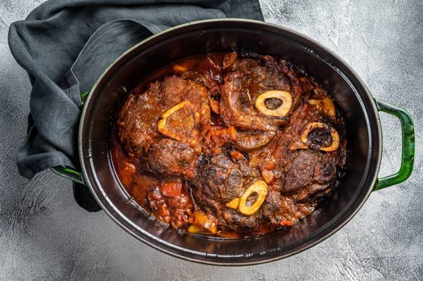 Braised Beef Shanks Recipe — Cross-cut beef shanks slow-braised in wine, paprika, and aromatics until the collagen melts into a